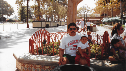 Daniel Segovia as a baby held by his grandfather Daniel Segovia Sr. 