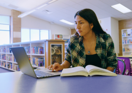 Student studying in library