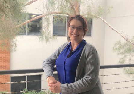 New Phoenix College Residential Faculty Rebecca Abeyta on campus outside her office.