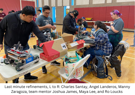 Phoenix College Kodiac Robotics team making last minute refinements on their robots for the VEX U competition