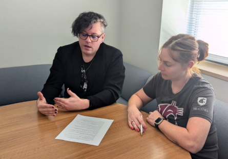 Phoenix College writing tutor Kevin Flanagan meets with a student in the Learning Commons