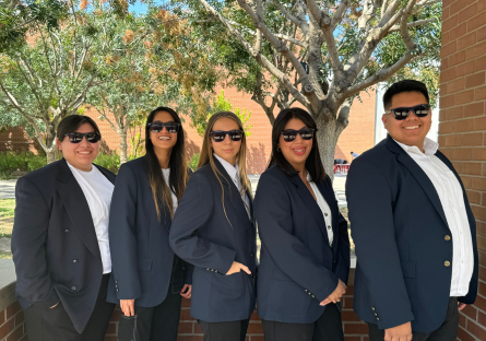 PC United Executive Team (outside in suits wearing sunglasses)