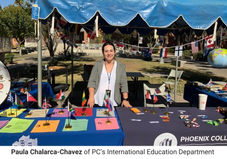 Paula Chalarca-Chavez, once an international student at Phoenix College, now supports international students in her role as International Education Department Program Analyst. Here, she stands at an information booth on campus during PC's International Education Week.  