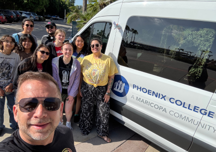 Honors Program Director Kenny Miller takes a selfie with Honors Program Advisor Safia Sampson and honors students who travelled by van to California for an Honors Program adventure.