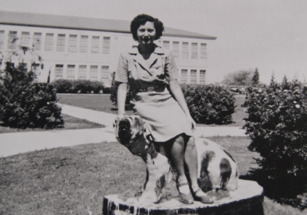 Student sitting on painted Bumstead statue