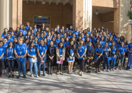High School students posing outside Bulpitt Auditorium