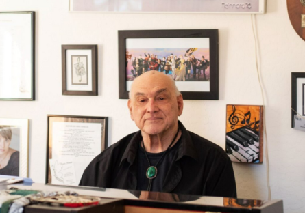 Joe Bousard at his piano at home