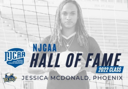 Jessica McDonald - black and white image holding soccer ball
