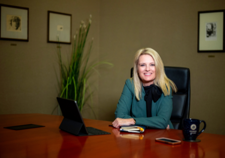 Dr. Kimberly Britt sitting at a conference table