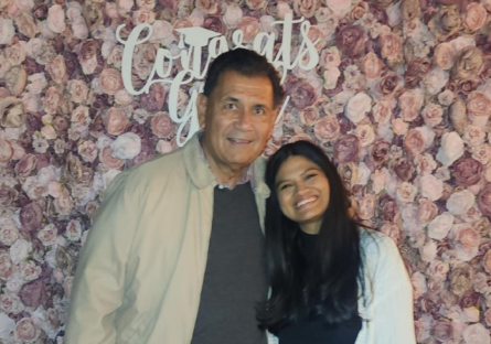 Phoenix College alumna Sandra Quiroz next to retired Phoenix College Professor Ernest Villacaña at Sandra's graduation party.