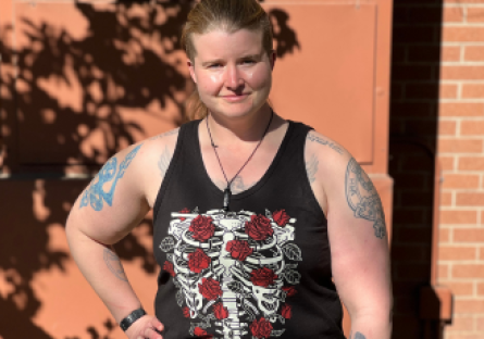 Phoenix College Communication faculty Allison Hawn makes visible some of her tattoos, which depict familial and Pictish symbols.