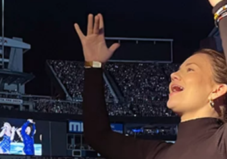 Jillian Deaton, a Phoenix College alumna and ASL interpreter at night one of Taylor Swift's "The Eras Tour" serving as a conduit for communication between the Deaf and Hard of Hearing and hearing parties