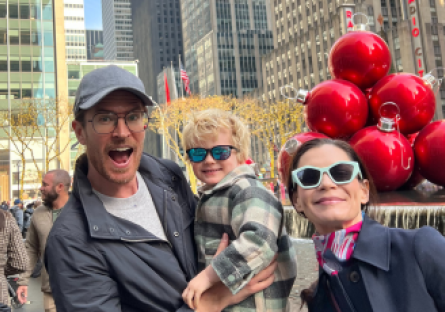 Reed, his wife, and their son navigating the crowds near Rockefeller Center during a mid-December weekend in 2023 - a testament to a successful journey that started at Phoenix College.