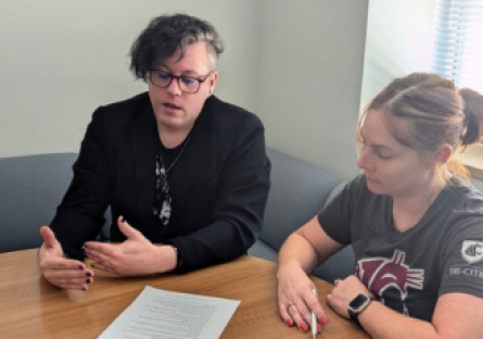 Phoenix College writing tutor Kevin Flanagan meets with a student in the Learning Commons