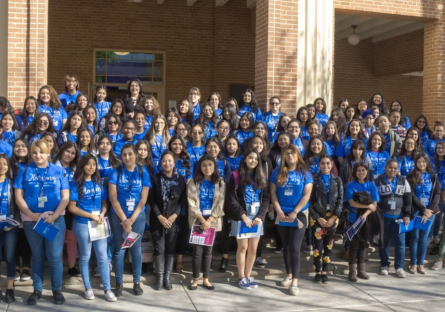 High School students posing outside Bulpitt Auditorium